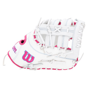 Side view of a white Wilson glove with pink trim and blue stitching, featuring a large pink "W" logo.