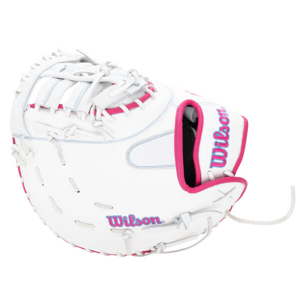 Side view of a white Wilson softball glove with pink trim and stitching, and "Wilson" logo.