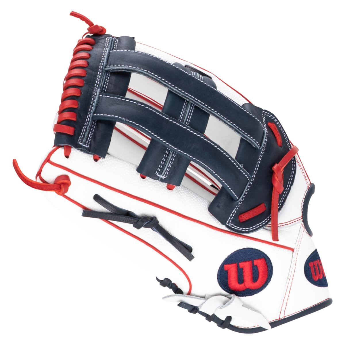 Top-down view of a white baseball glove with navy blue and red accents, featuring a red "W" logo.