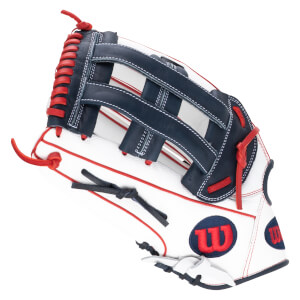 Top-down view of a white baseball glove with navy blue and red accents, featuring a red "W" logo.