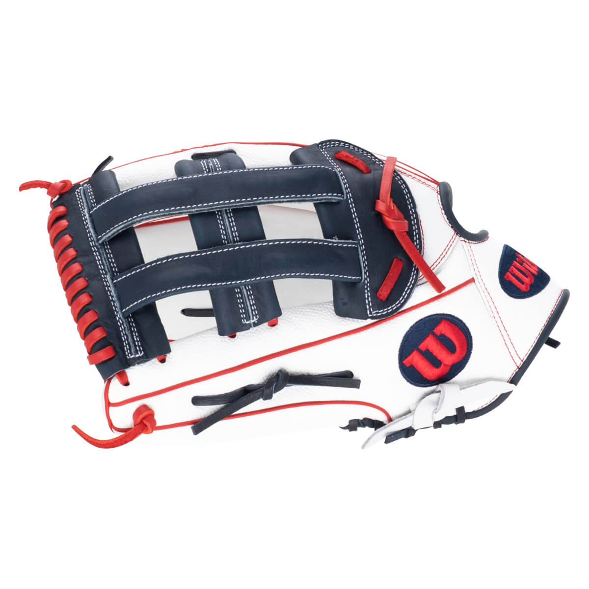 Top-down view of a white baseball glove with navy blue and red accents, featuring a red Wilson "W" logo.