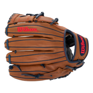 Angled front view of a brown baseball glove with red Wilson logos, navy blue lacing, and red stitching.