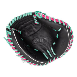 Top-down view of a black catchers mitt with hot pink and mint green lacing, white piping, and A1000 embossed on the palm.