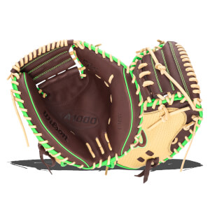 Interior view of a brown Wilson A1000 baseball glove with bright green lacing and a tan palm.