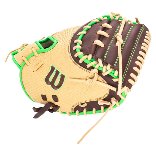 Top-down view of a brown and tan baseball glove with bright green lacing and a green "W" logo.
