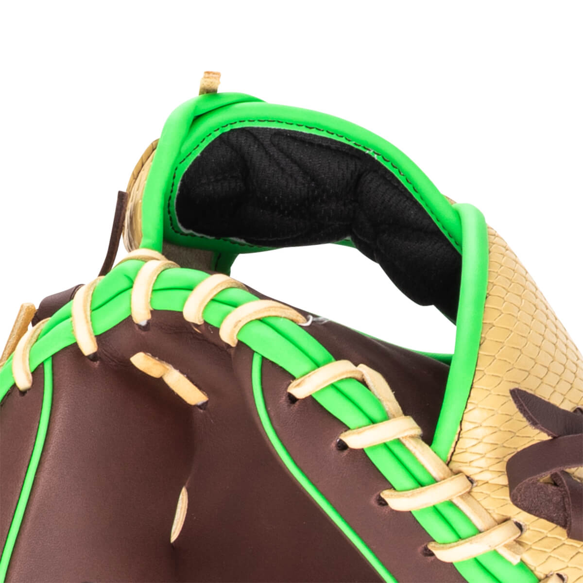 Close-up of a brown baseball glove with bright green lacing and a textured tan palm.