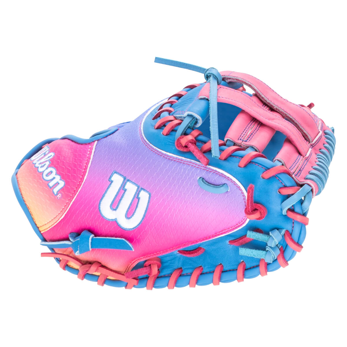Side view of a colorful baseball glove with a pink, purple, and blue gradient, featuring a white "W" logo and pink lacing.