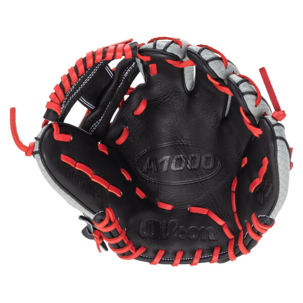 Top-down view of a black baseball glove with red lacing and "A1000" and "Wilson" logos.