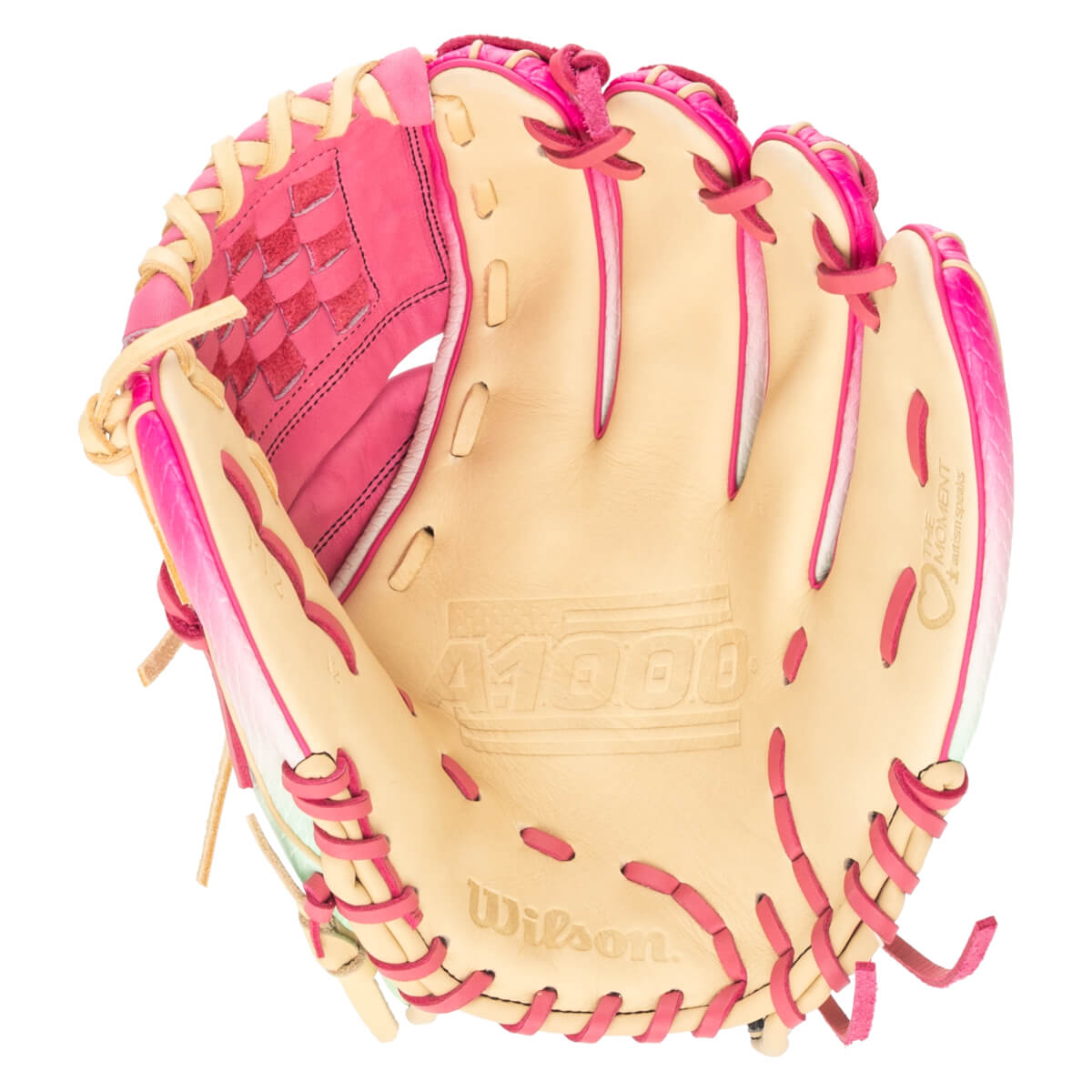 Top-down view of a tan and pink Wilson A1000 baseball glove with "THE MOMENT" text.