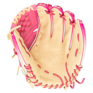 Top-down view of a tan and pink Wilson A1000 baseball glove with "THE MOMENT" text.