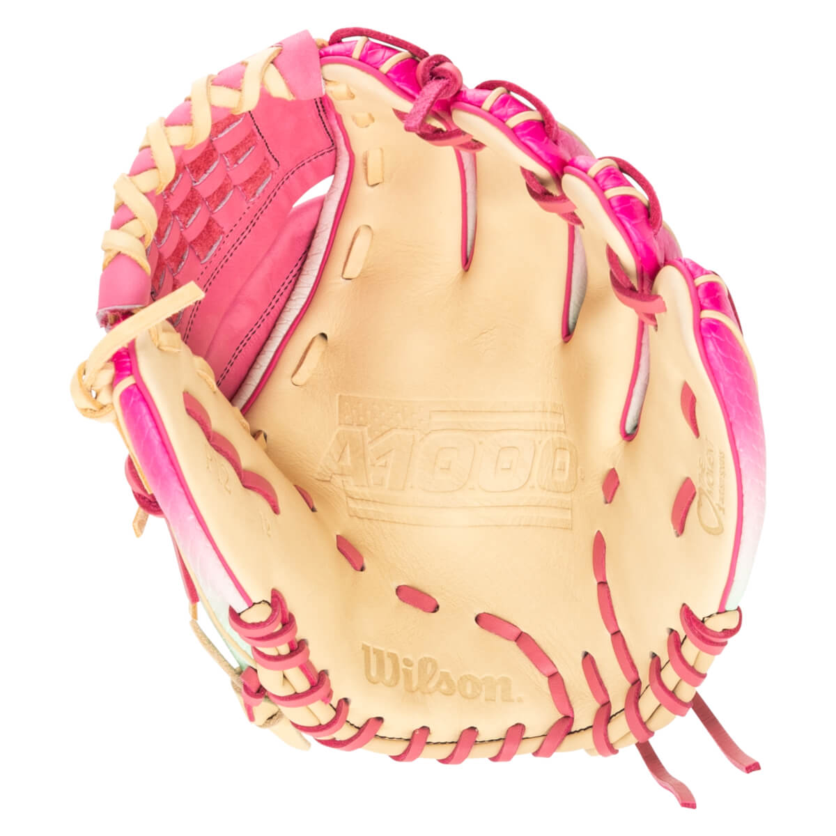 Top-down view of a pink and tan Wilson A1000 baseball glove with pink lacing and embossed logos.