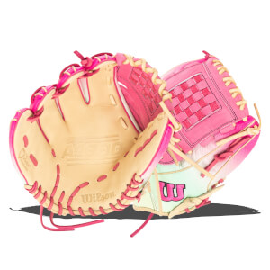Front view of a pink and tan Wilson A1000 baseball glove with a checkered web and "The Moment" logo.