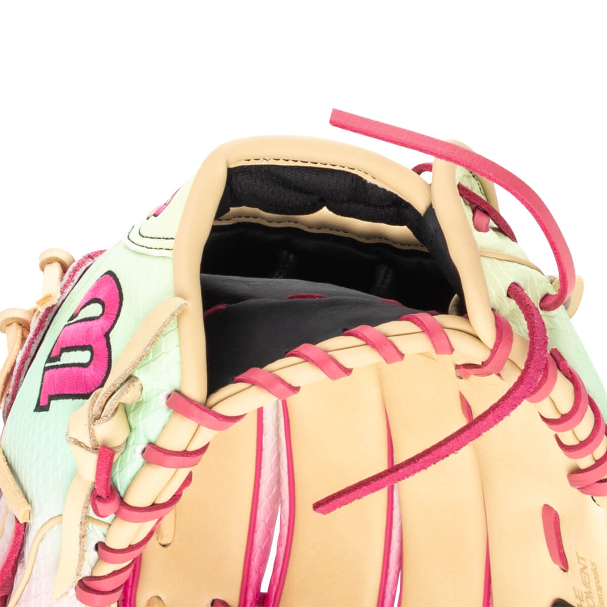Close-up of a baseball glove's interior showing tan leather, black padding, and pink lacing.