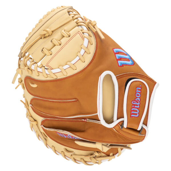 Top-down view of a tan baseball glove with red stitching, a blue "W" logo, and "Wilson" embroidered on the wrist strap.