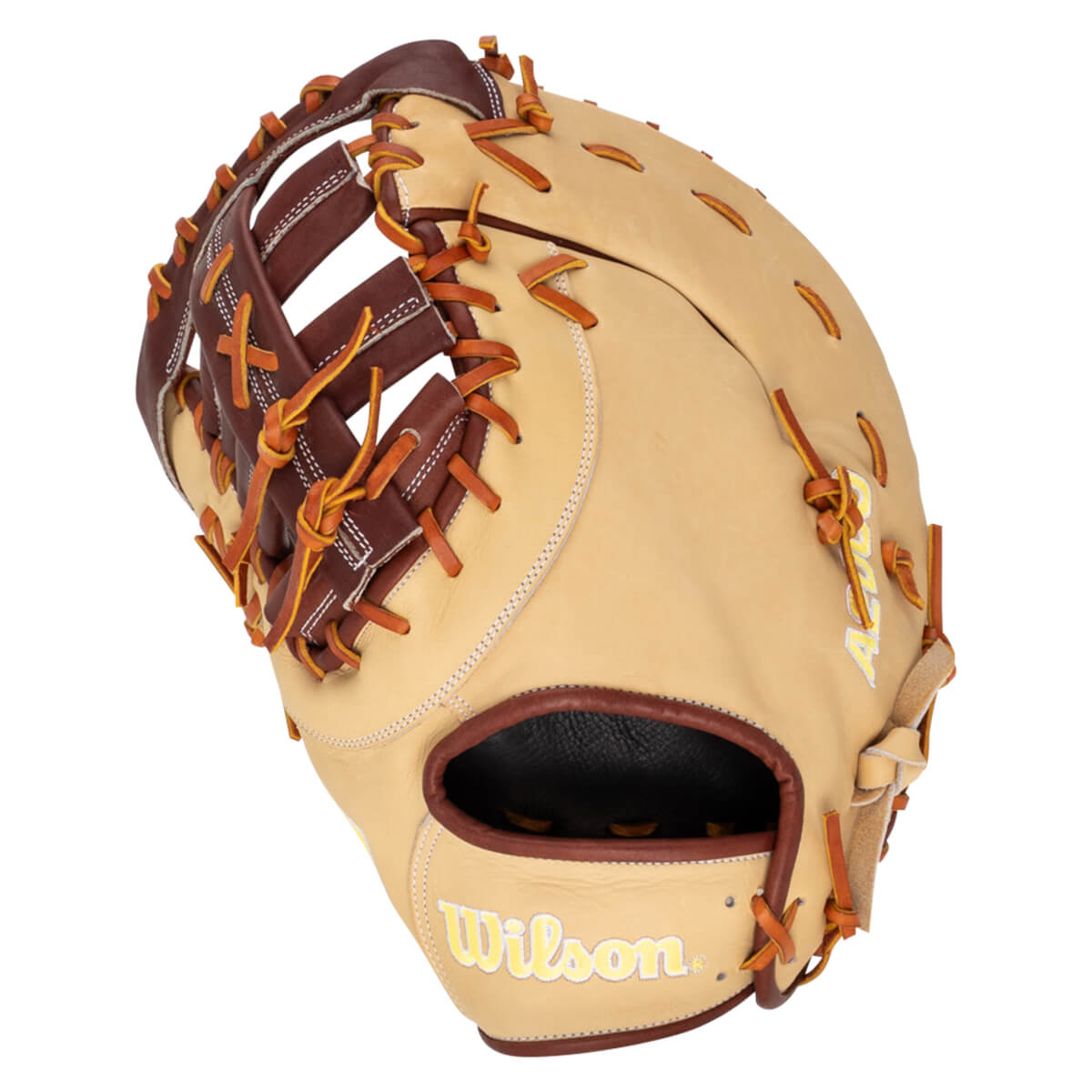 Angled view of a tan baseball glove with brown lacing, showing the "Wilson" logo in yellow.