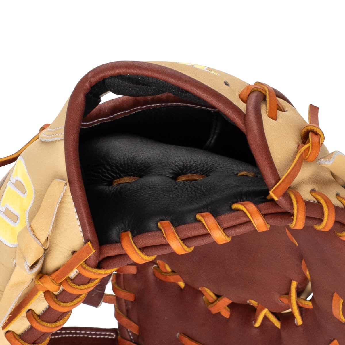 Close-up of a baseball glove showing the tan leather pocket with brown lacing and a black interior.