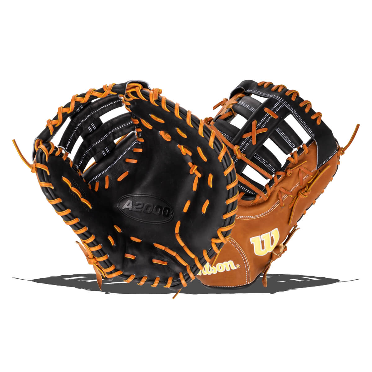 Front view of two baseball gloves, one black with "A2000" and orange lacing, the other tan with a yellow "W" logo.