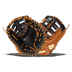 Front view of two baseball gloves, one black with "A2000" and orange lacing, the other tan with a yellow "W" logo.