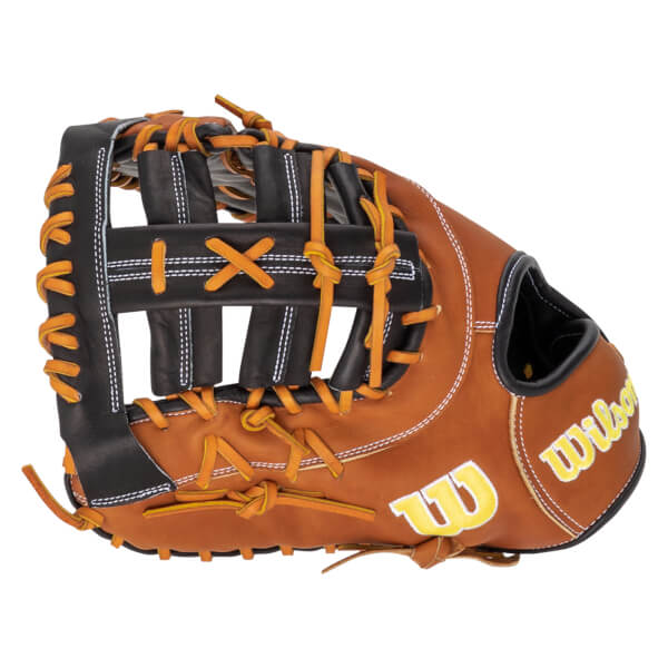 Side view of a brown baseball glove with orange lacing, black webbing, and yellow "Wilson" text.
