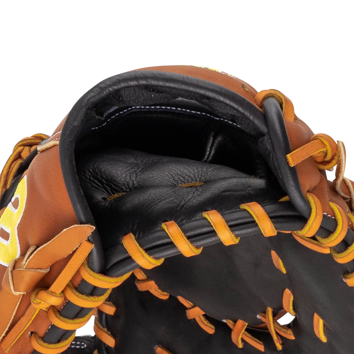 Close-up of the pocket of a brown and black baseball glove with orange lacing.