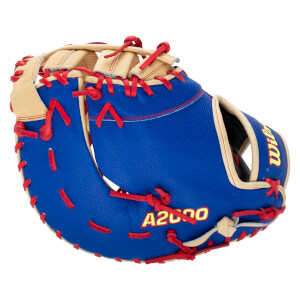 Back view of a royal blue baseball mitt featuring red laces, tan leather trim, and yellow A2000 and Wilson logos.