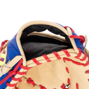 Close-up of the wrist opening on a tan and blue baseball glove featuring red lacing, a black padded interior, and a yellow Wilson logo.