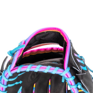 Close-up of the wrist opening featuring black leather with vibrant pink, purple, and blue gradient piping and bright blue laces.