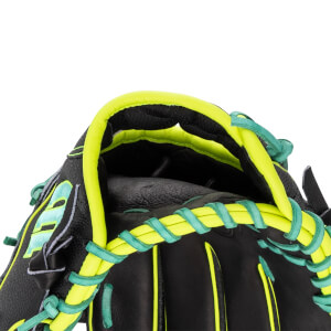 Close-up of the wrist opening shows neon yellow binding and mint green lacing against a black shell with a partial mint green Wilson logo.