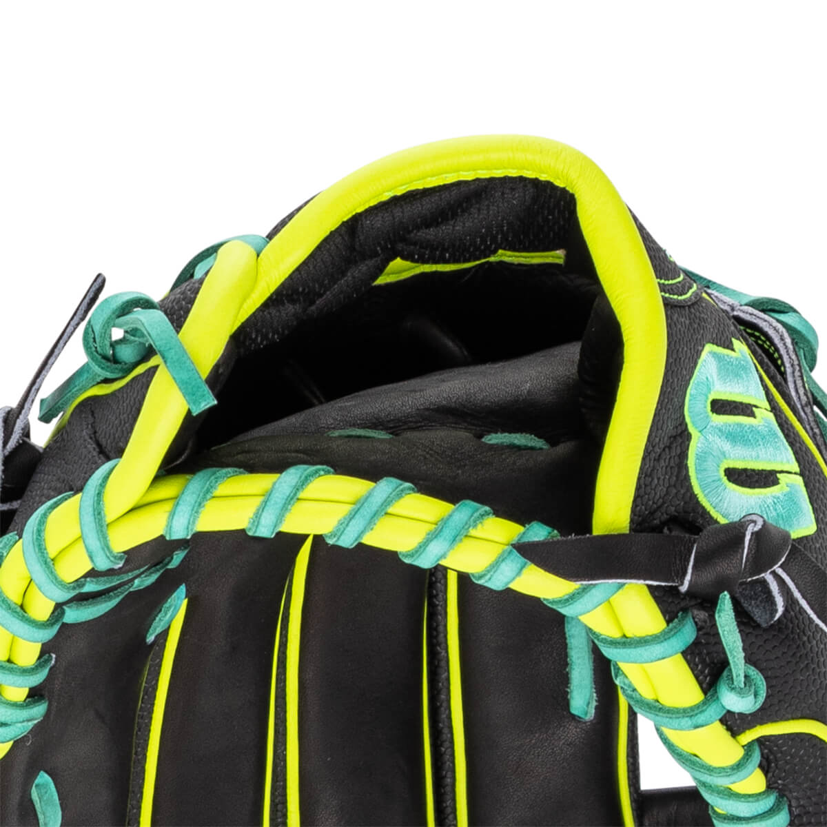 Close-up of the hand opening on a black baseball glove featuring neon yellow trim, teal laces, and a teal embroidered Wilson W logo.