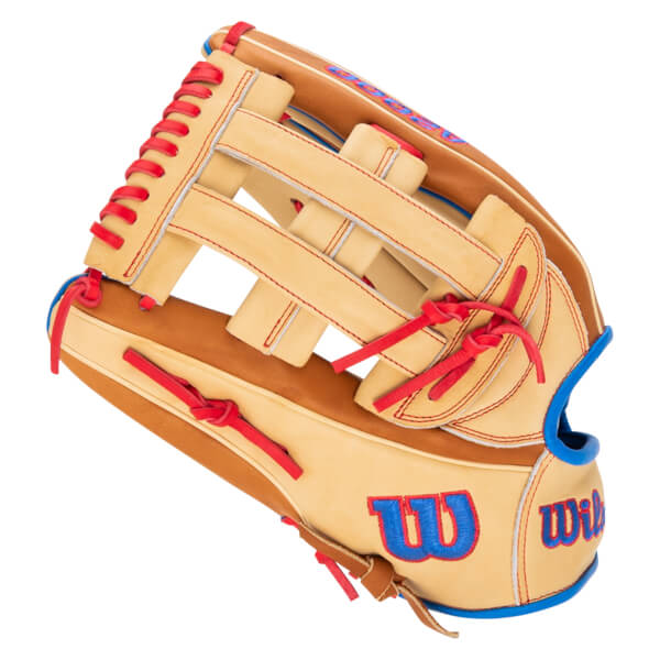 Side view of a tan baseball glove with red lacing, blue trim, and "Wilson" embroidered in blue.