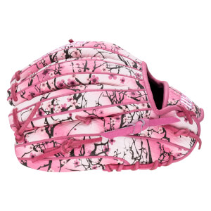 Back view of a baseball glove featuring a pink and white cherry blossom pattern with black branches, pink laces, and a white "W" logo on the thumb.