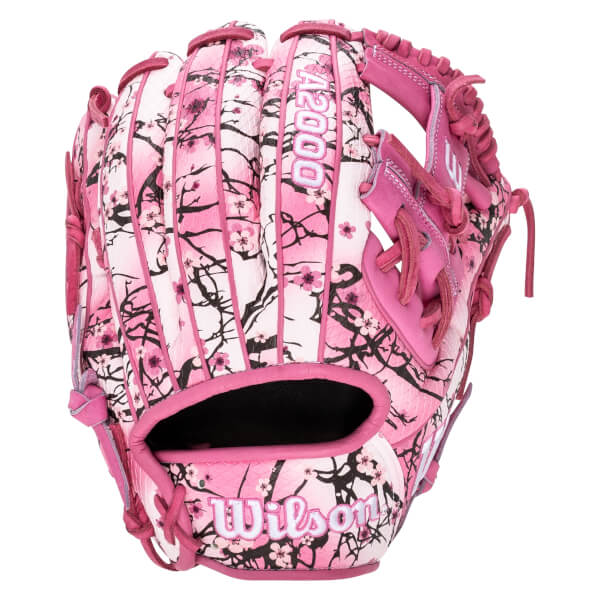 Back view of a pink Wilson A2000 glove featuring a white and black cherry blossom floral pattern with the "A2000" and "Wilson" logos clearly visible.