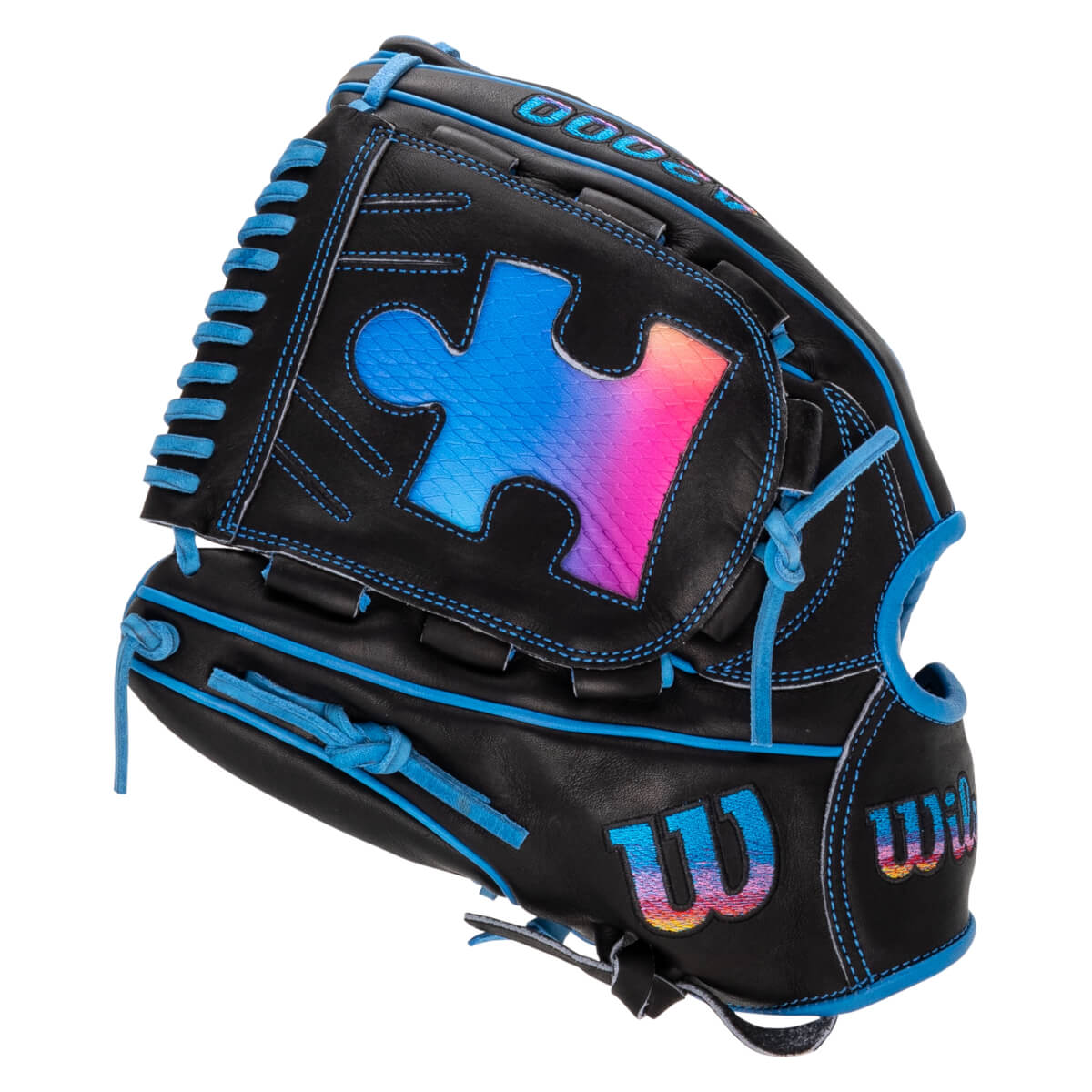 Front view of a black baseball glove featuring a gradient puzzle piece on the web, blue lacing, and Wilson and A2000 logos in a blue-to-pink color scheme.