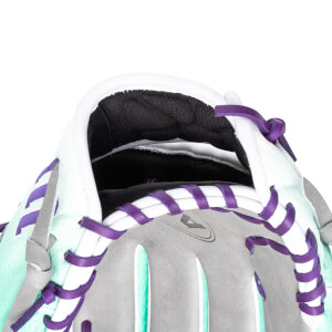 Close-up of the interior of a baseball glove showing white padding, purple lacing, and a textured mint green exterior.