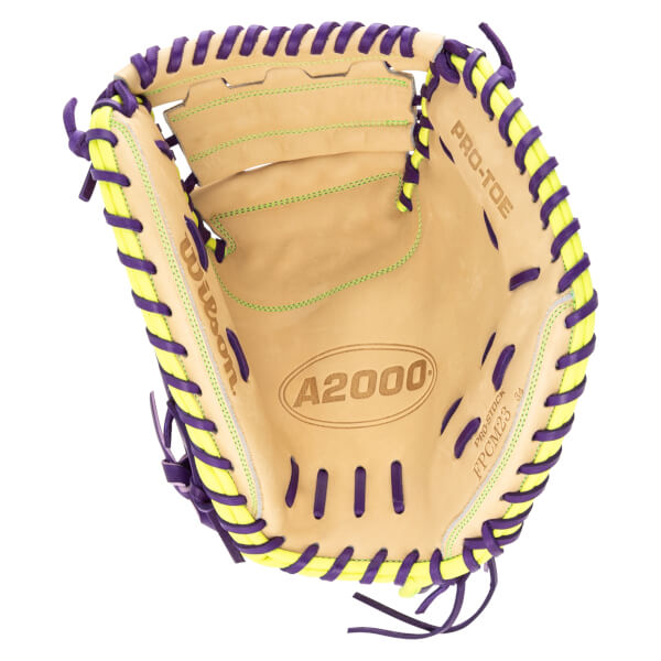 Top-down view of a tan baseball glove with purple and yellow lacing, featuring "A2000" and "PRO-STOCK" branding.