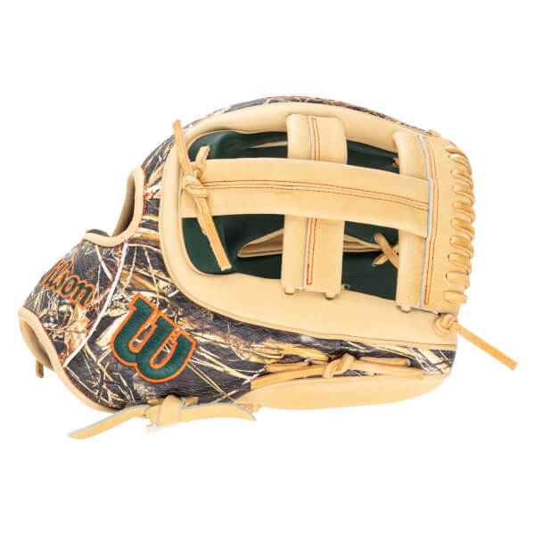 Side view of a baseball glove with a camouflage pattern, a green "W" logo, and orange stitching.
