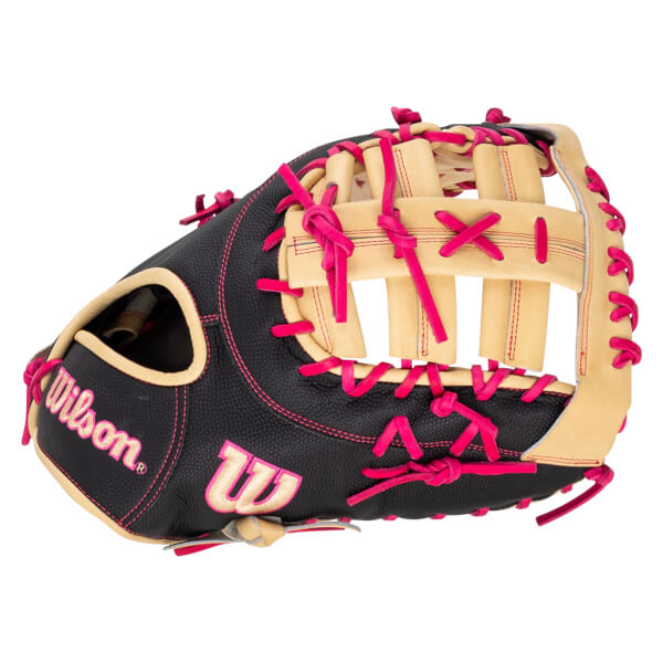 Top-down view of a black baseball glove with pink lacing and "Wilson" logo.