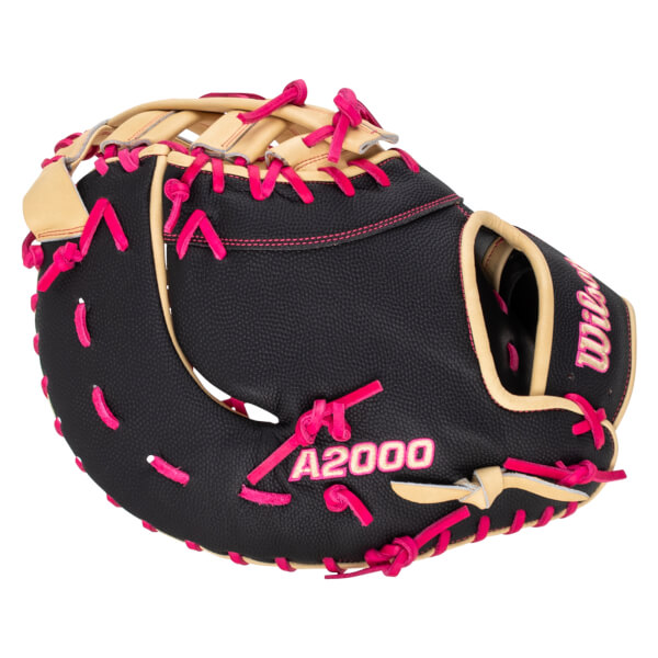 Front view of a black Wilson A2000 baseball glove with tan accents and bright pink lacing.