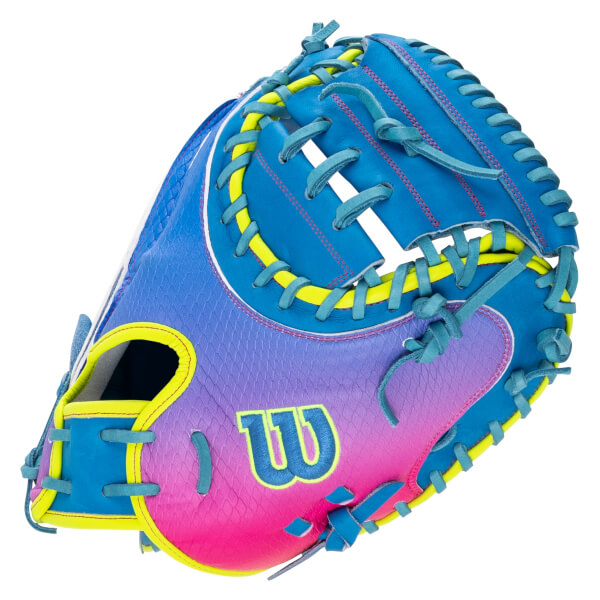 Back view of a colorful catcher's mitt featuring a blue to pink gradient, neon yellow accents, and a blue Wilson "W" logo.