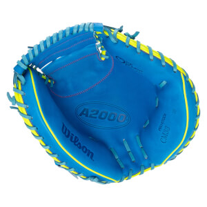 Front view of the inside pocket of a blue Wilson catcher's mitt with neon yellow trim, featuring prominent "Wilson", "A2000", and "CM33 Love The Moment" branding.
