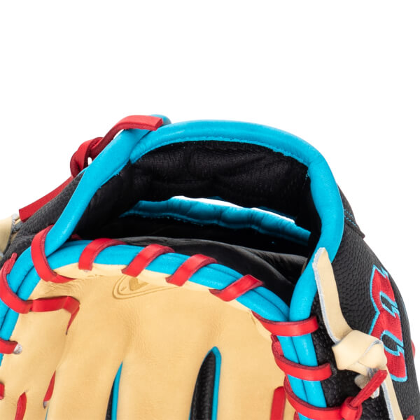 Close-up of a baseball glove showing black textured material, tan leather, and red and blue lacing.