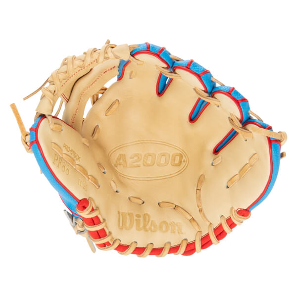 Top-down view of a tan baseball glove with blue and red accents, featuring "A2000" and "Wilson" branding.