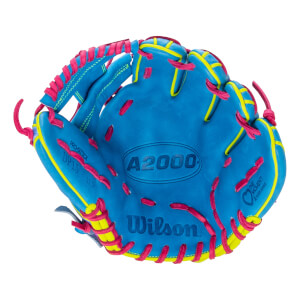 Front view of a bright blue Wilson A2000 baseball glove with pink laces and yellow trim, featuring the Wilson, A2000, and Love the Moment Autism Speaks logos.