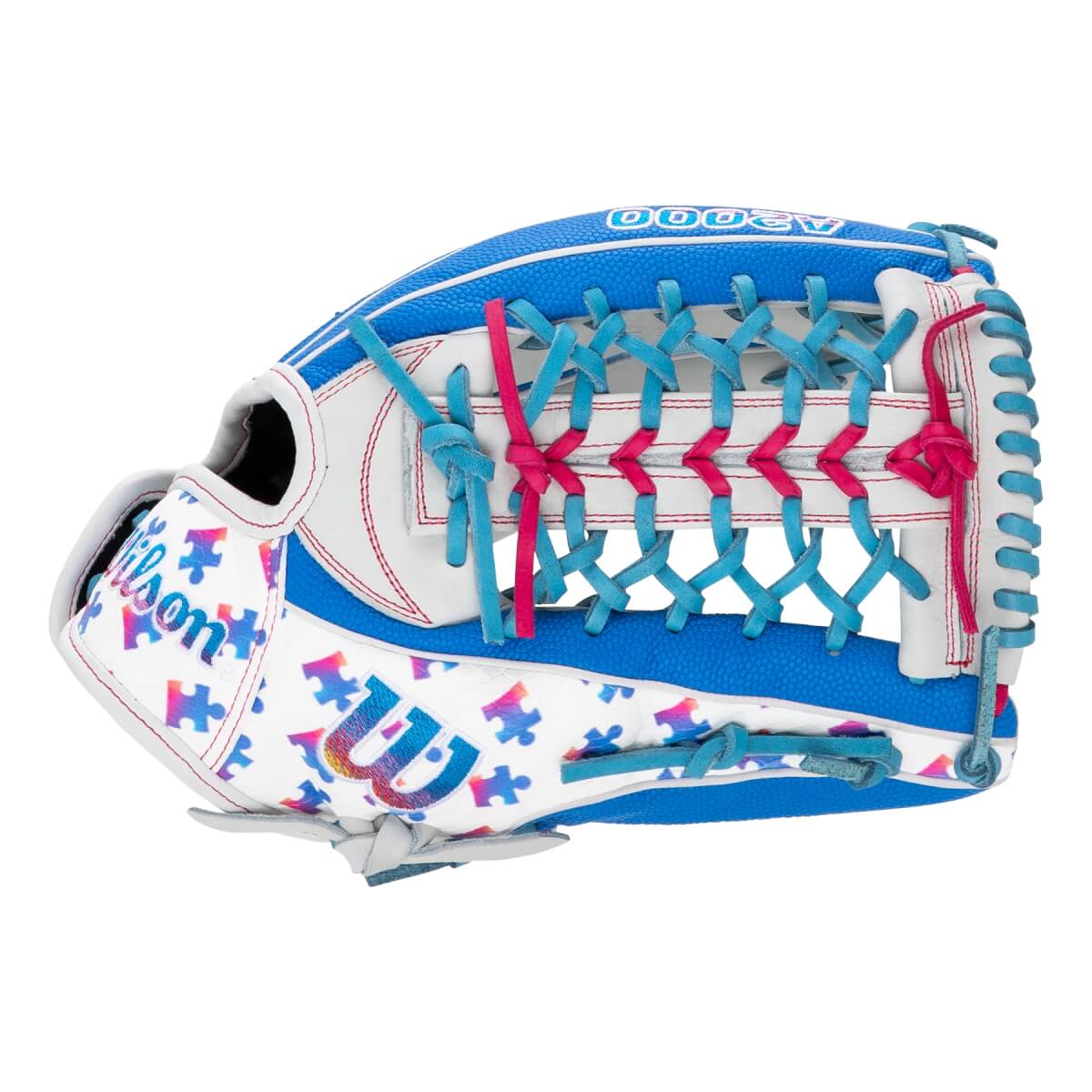 Back view of a white Wilson A2000 softball glove featuring blue panels, a colorful puzzle piece pattern, and pink and blue laces on the webbing.