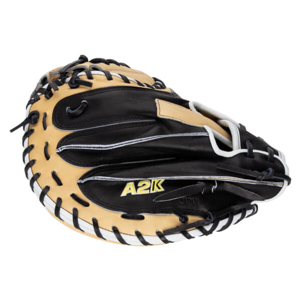 Top-down view of a black and tan baseball glove with "A2K" and "JAPAN" visible.