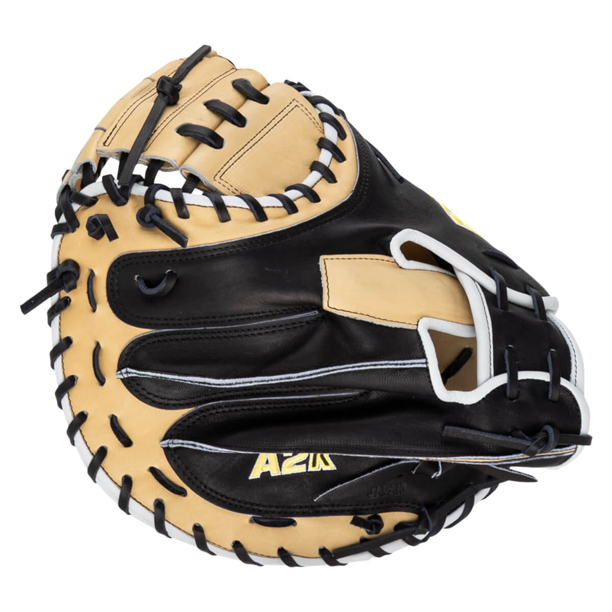 Front view of a black and tan catcher's mitt with white lacing and "AZ2K JAPAN" visible.