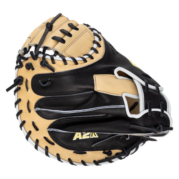 Front view of a black and tan catcher's mitt with white lacing and "AZ2K JAPAN" visible.