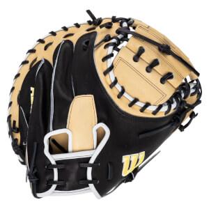 Side view of a black and tan baseball glove with white lacing and a yellow "W" logo.