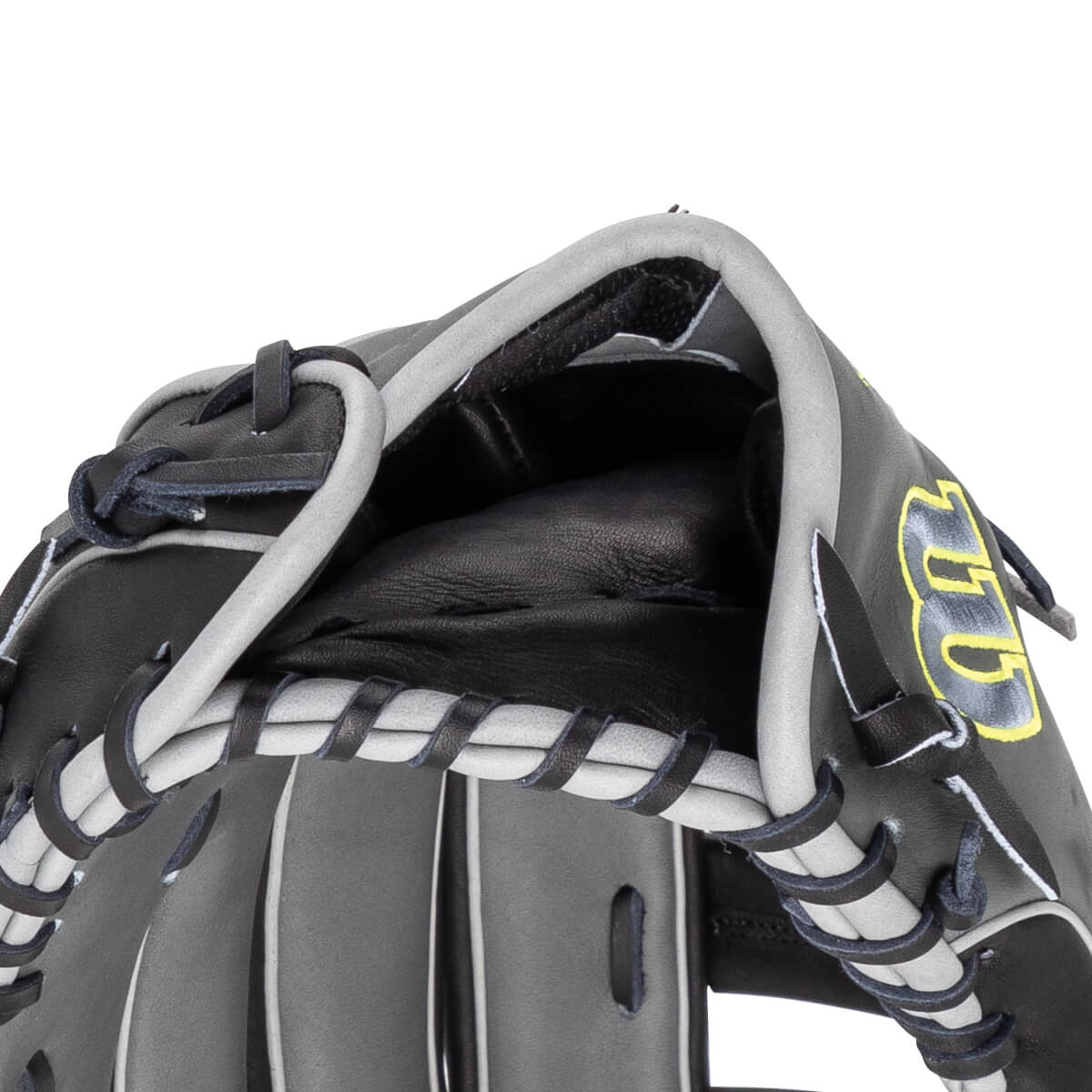 Close-up of a black and gray baseball glove showing the lacing and the yellow "GG" logo.