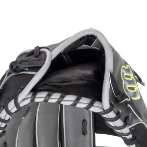 Close-up of a black and gray baseball glove showing the lacing and the yellow "GG" logo.